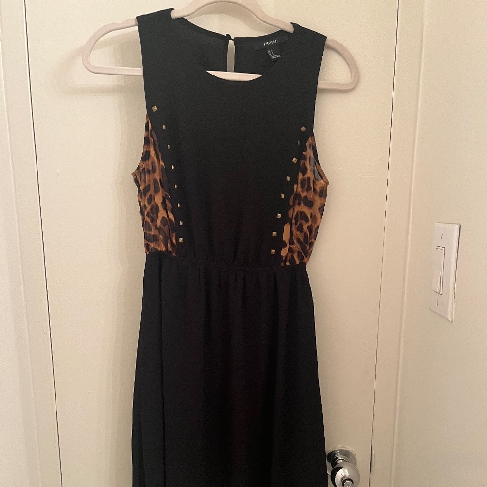 Leopard print and black dress with brass studs